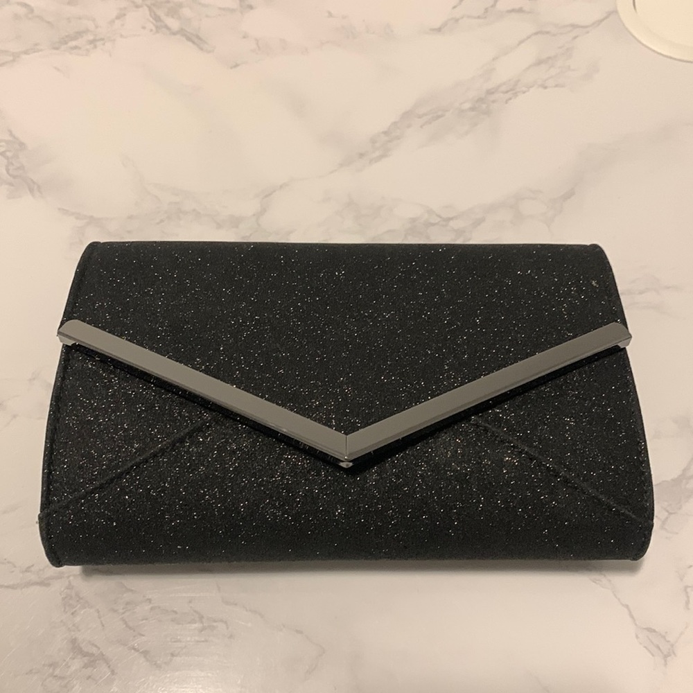 Taxi like new black sparkle clutch